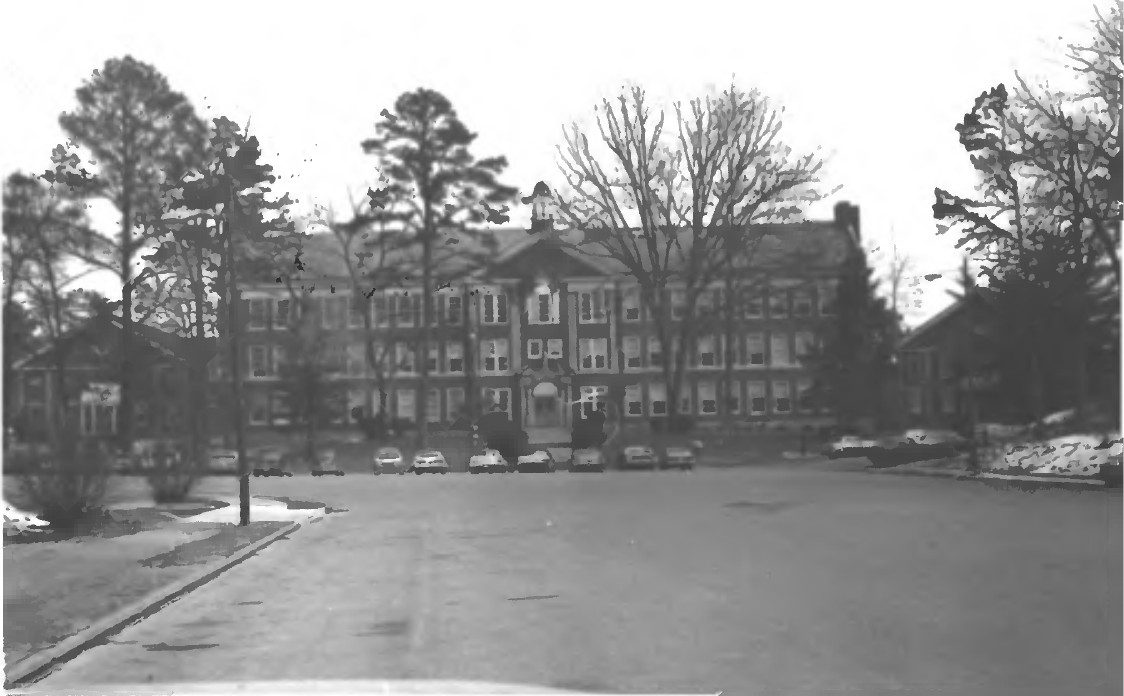 1979 black-and-white view of the Brainerd Junior High campus seen from the parking lot